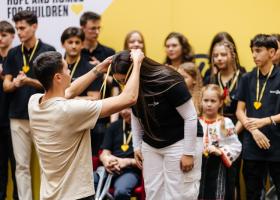  David Popovici își donează ziua de naștere pentru viitorii campioni