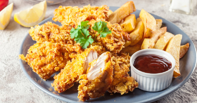 Rețeta rapidă: Pui crispy în crustă de fulgi de porumb la cuptor