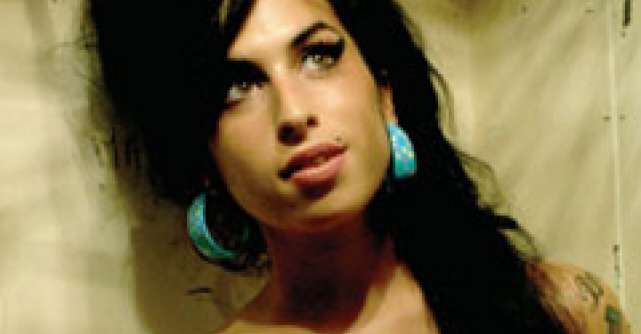 Sotul lui Amy Winehouse facea bani buni din...saruturi